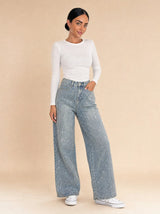 Jeans a palazzo ricoperti di brillantini Luméa