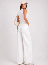Pantalone denim a palazzo con ricami sui lati