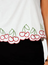 T-shirt con ricami ciligie bordo ondulato