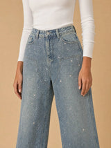 Jeans a palazzo ricoperti di brillantini Luméa
